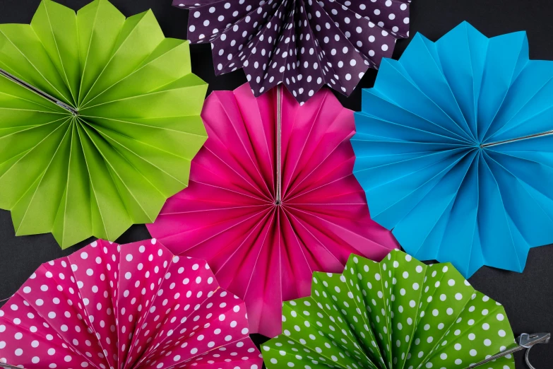 a bunch of paper flowers sitting on top of a table, vector art, by Rachel Reckitt, unsplash, pop art, polka dot tables, fans hals, coated pleats, bright neon