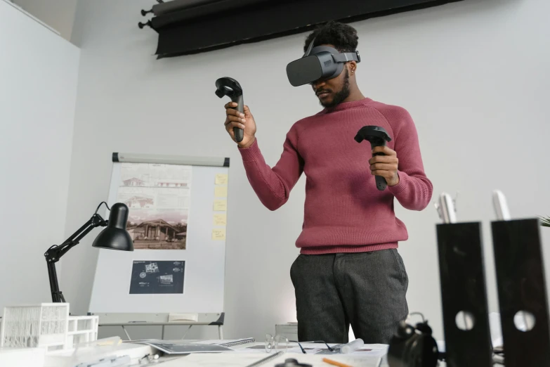 a man in a pink shirt holding a video game controller, a digital rendering, unsplash, hyperrealism, : kanye west wearing vr goggles, architect, teaching, hyper reali sm