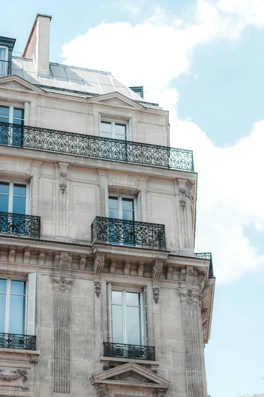 a tall building with many windows and balconies, trending on unsplash, paris school, chaumet, 1 7 9 5, fan favorite, neoclassicism style