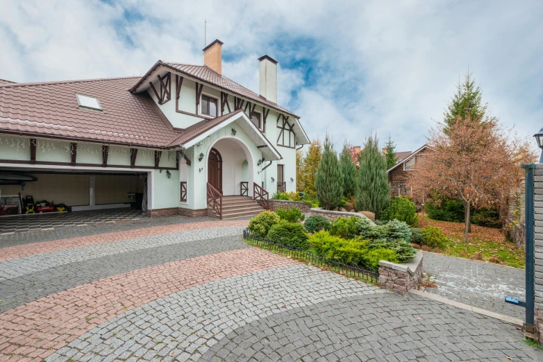 a house with a driveway in front of it, by Gabor Szikszai, pexels contest winner, art nouveau, paved, фото девушка курит, luxury materials, studio photo