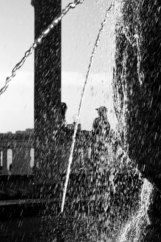 a black and white photo of a fire hydrant spewing water, inspired by Louis Stettner, with cobwebs, under waterfall, cityscape, ffffound