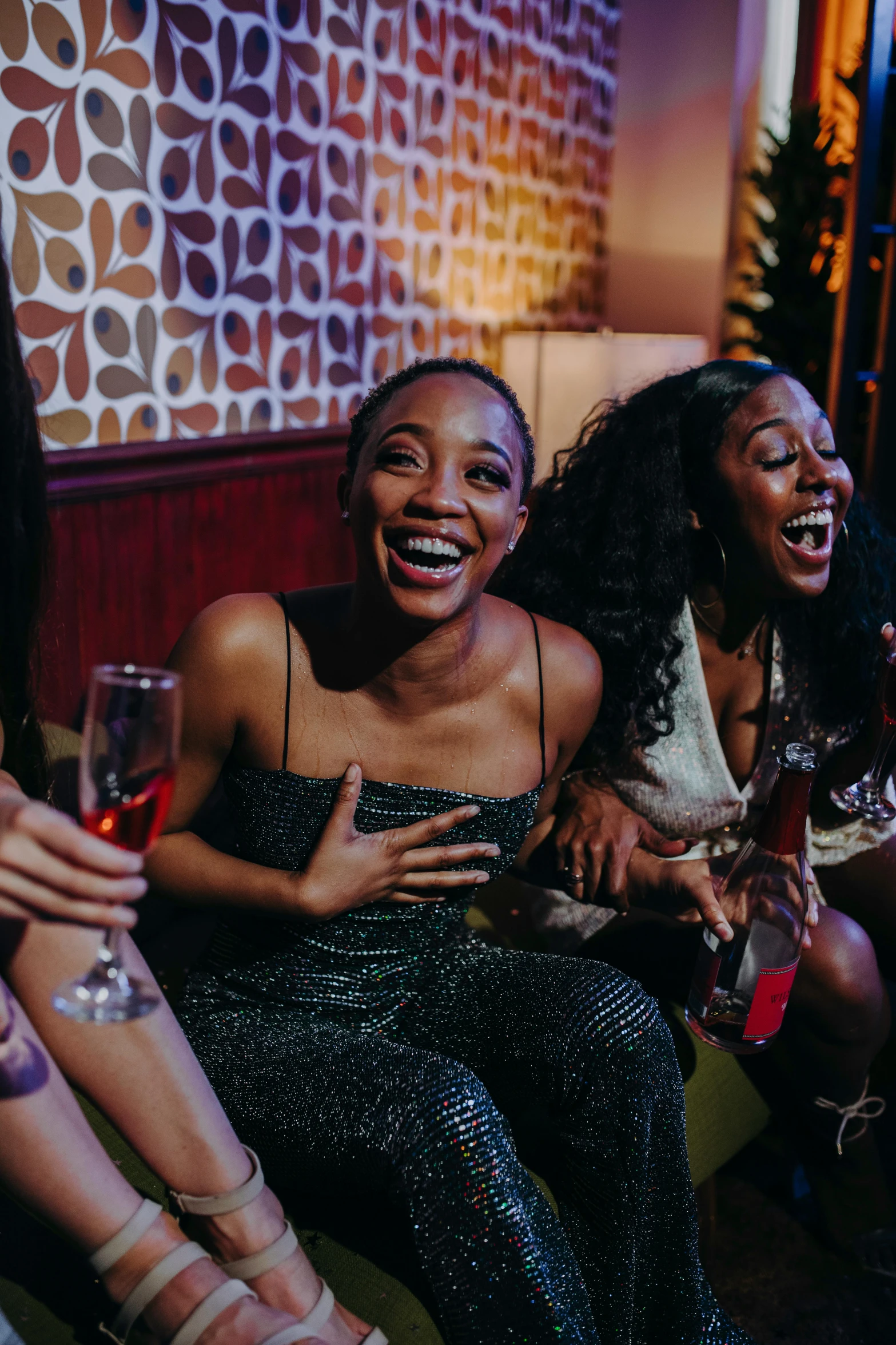 a group of women sitting next to each other at a party, trending on pexels, happening, laughter and screaming face, photo of a black woman, smiling seductively, ilustration