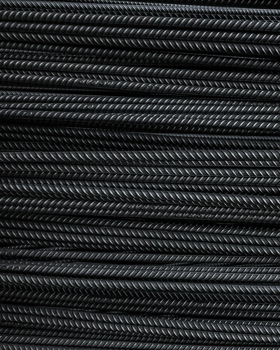 a coil of black wire on a white background, reddit, on a black background, zig zag, steel studs, straw