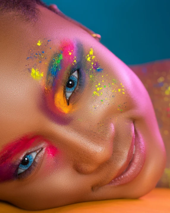 a close up of a woman with glitter on her face, an album cover, inspired by Lisa Frank, trending on pexels, afrofuturism, happy colors, colorful octane render, androgynous face, freckles on chicks
