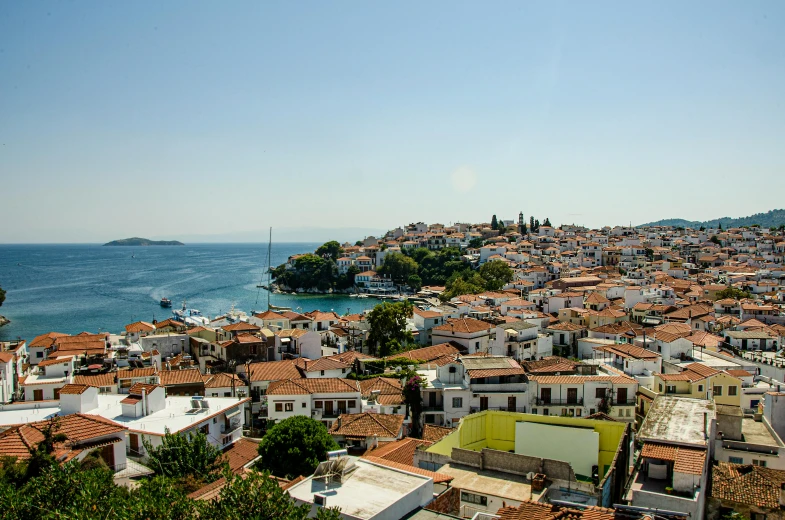 a view of a town from the top of a hill, by Meredith Dillman, pexels contest winner, renaissance, white buildings with red roofs, archipelago, alexandros pyromallis, slide show