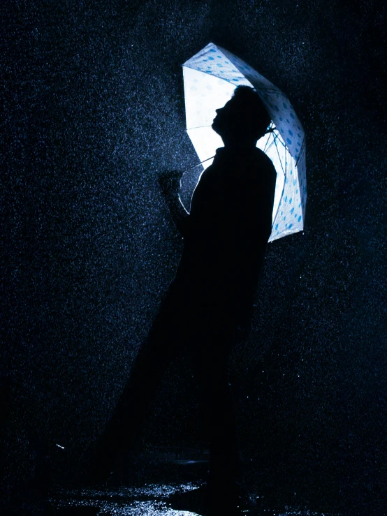 a man standing in the rain holding an umbrella, shadowy lighting, profile image, stood in a tunnel, profile pic