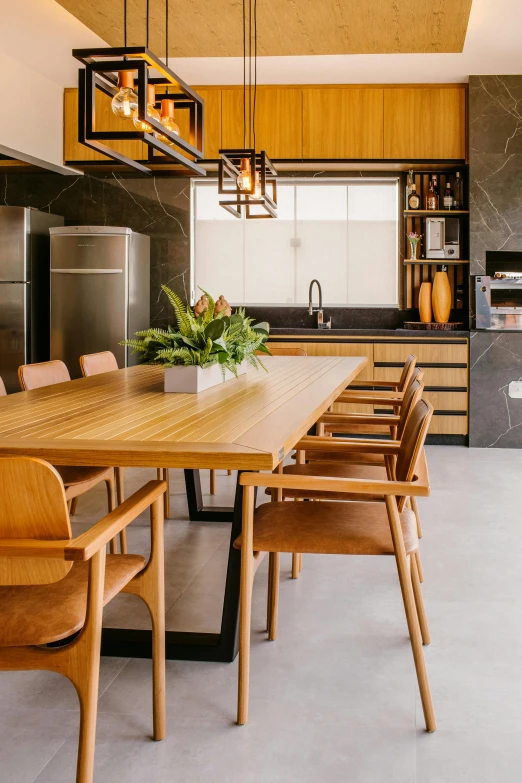 a dining room with a wooden table and chairs, inspired by Fernando Gerassi, kitchen counter, são paulo, sustainable materials, leather apron