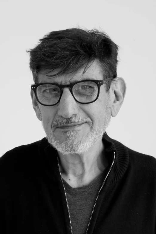a black and white photo of a man with glasses, a black and white photo, inspired by René Burri, shutterstock, photorealism, leonard nimoy, fassbinder, middle aged man, portrait of mélenchon