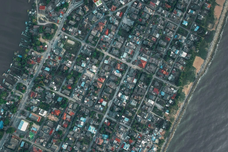 an aerial view of a city next to a body of water, a colorized photo, hyperrealism, bangladesh, suburbia street, high res 8k, 🦑 design