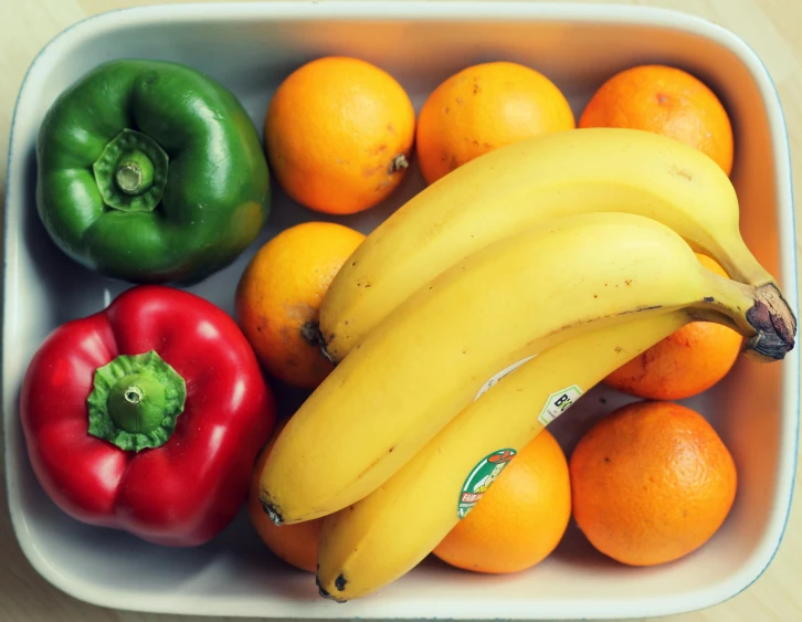 a close up of a bowl of fruit and vegetables, by Everett Warner, pexels, bananas, rectangle, six pack, instagram photo