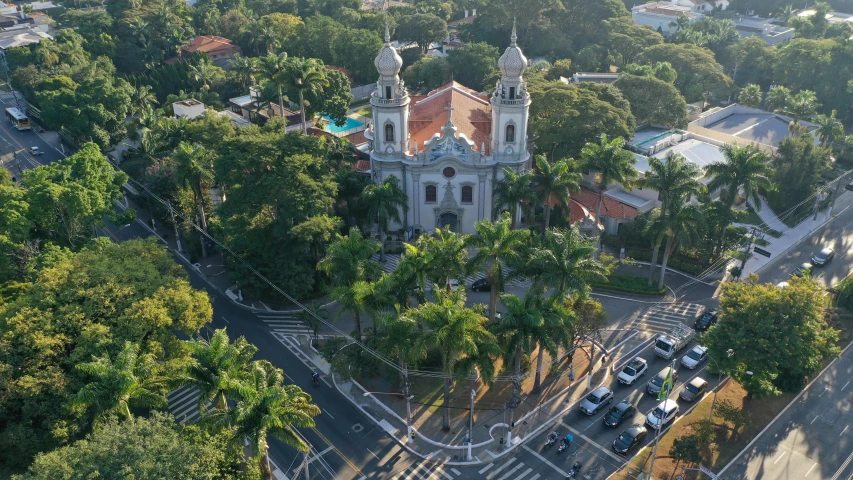 an aerial view of a church surrounded by trees, by Sam Dillemans, streets of salvador, thumbnail, square, high res 8k