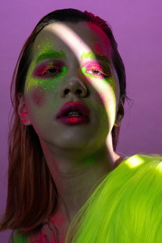 a woman with green hair and neon makeup, an album cover, inspired by Russell Dongjun Lu, trending on pexels, green and purple studio lighting, like a catalog photograph, woman portrait made out of paint, !!! colored photography