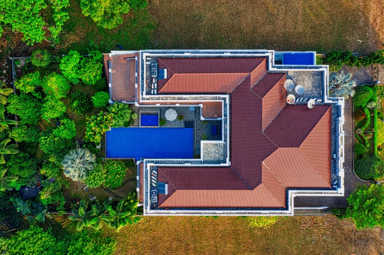 an aerial view of a house surrounded by trees, pexels contest winner, modernism, next to a tropical pool, super detailed image, blue print, shot from roofline