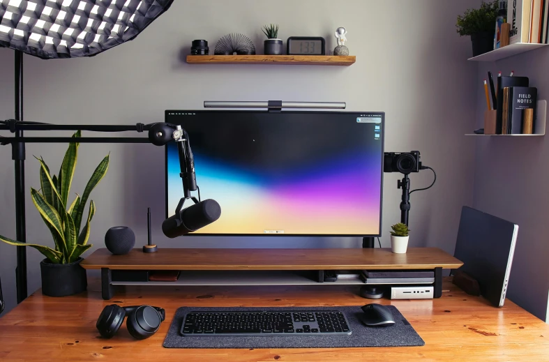 a desktop computer sitting on top of a wooden desk, inspired by Kanō Hōgai, unsplash, twitch tv, couch desk, evenly lit, everything fits on the screen