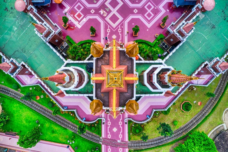 an aerial view of the top of a building, pexels contest winner, maximalism, thai temple, parks and gardens, pink, holy geometry