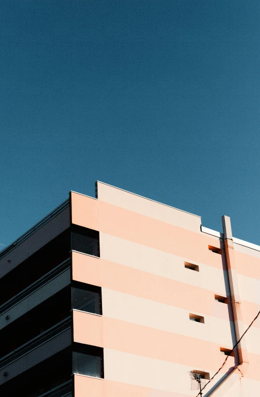 a traffic light hanging off the side of a building, by Lee Loughridge, unsplash, brutalism, blue and pink, 15081959 21121991 01012000 4k, clemens ascher, looking to the sky