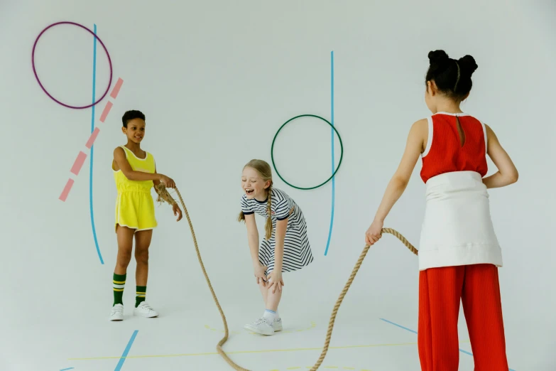 a group of children playing a game of hop hop hop hop hop hop hop hop hop hop hop hop hop hop hop hop hop hop hop hop, by Emma Andijewska, pexels contest winner, interactive art, showstudio, a girl playing tennis, ropes, lookbook