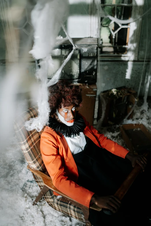 a woman sitting on top of a couch covered in snow, black arts movement, inside a haunted house, curly afro, dry ice, serious business