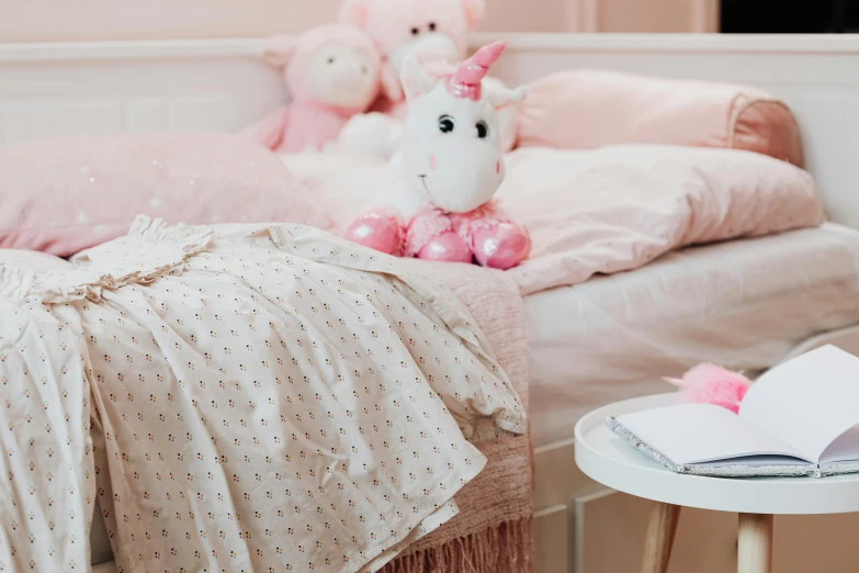 a little girl's bedroom decorated in pink and white, pexels contest winner, stuffed animal, unicorns, small and cosy student bedroom, highly polished