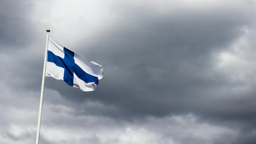 a blue and white flag flying in front of a cloudy sky, inspired by Eero Järnefelt, unilalianism, square, ap news, green, european