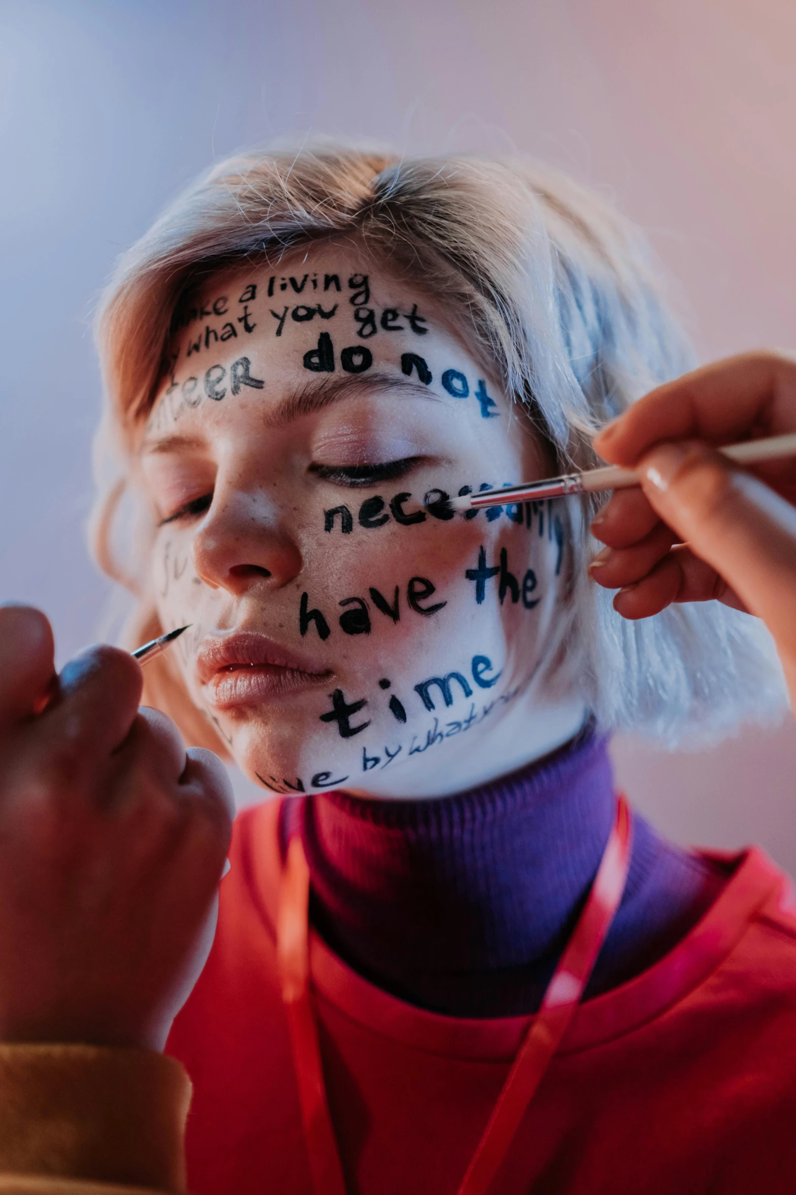 a woman has her face painted with words, by Julia Pishtar, photo taken in 2 0 2 0, promo photo, jovana rikalo, cut-scene