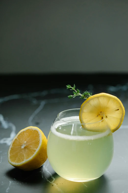 a glass of lemonade with a slice of lemon, a portrait, unsplash, renaissance, pale green glow, thumbnail, flying shot, indoor shot