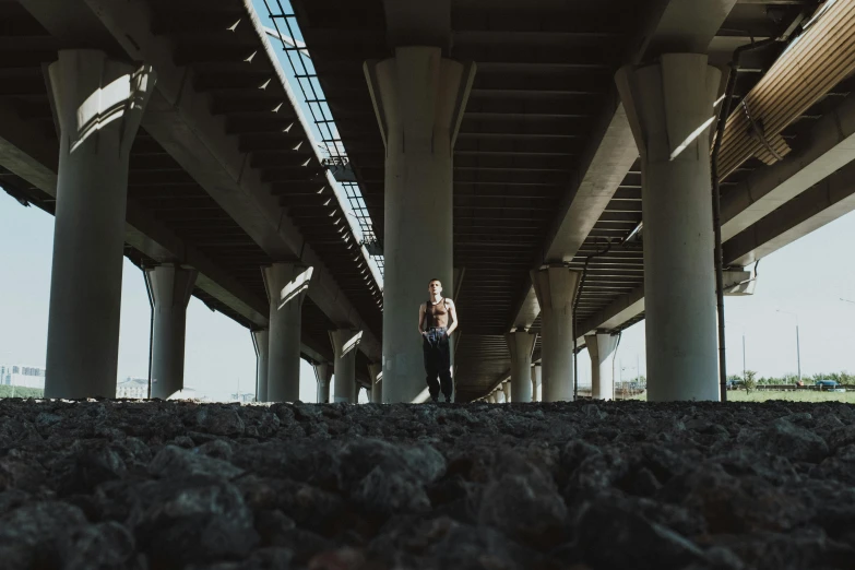 a couple of people standing under a bridge, a portrait, unsplash, running, iron and asphalt, fully body photo, stacked image