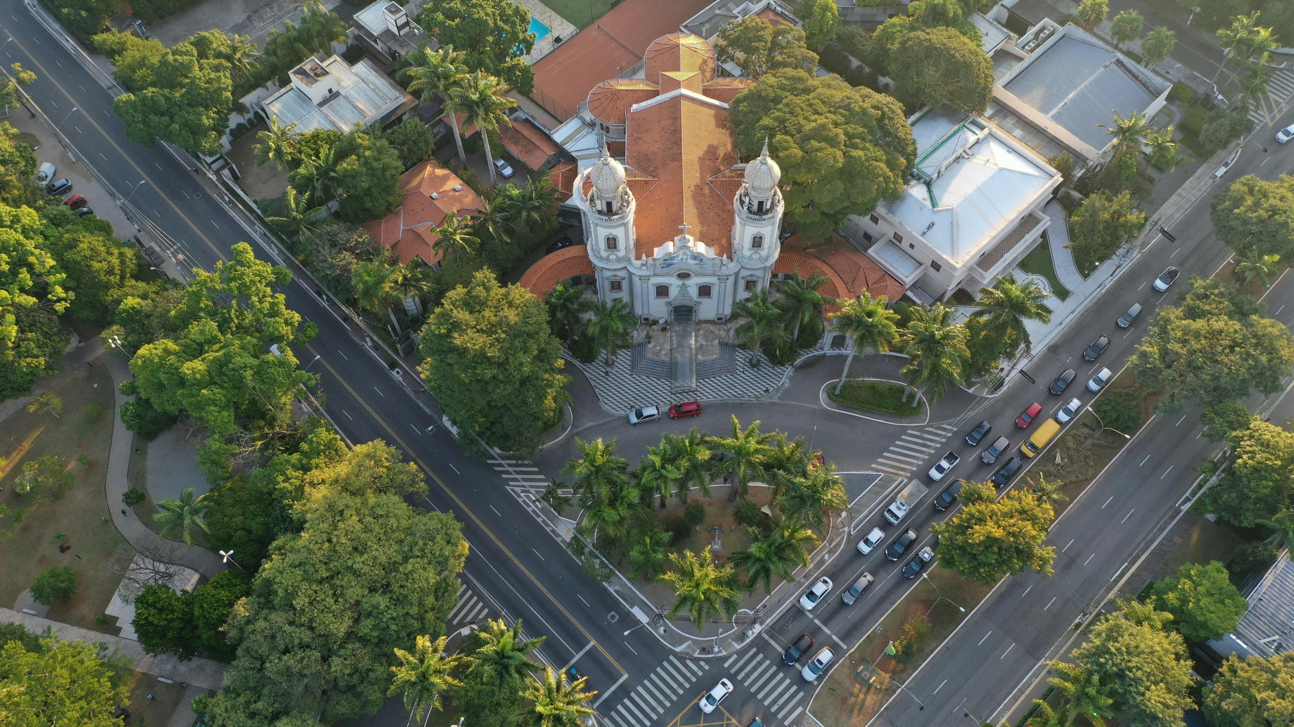 an aerial view of a church surrounded by trees, renaissance, avenida paulista, near the beach, square, high res 8k