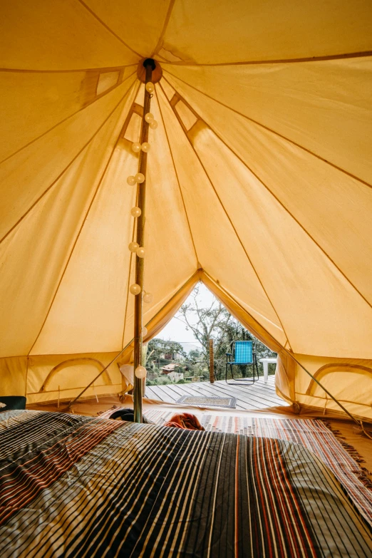 a view of the inside of a tent, light and space, bulli, high view, brightly lit room, cream