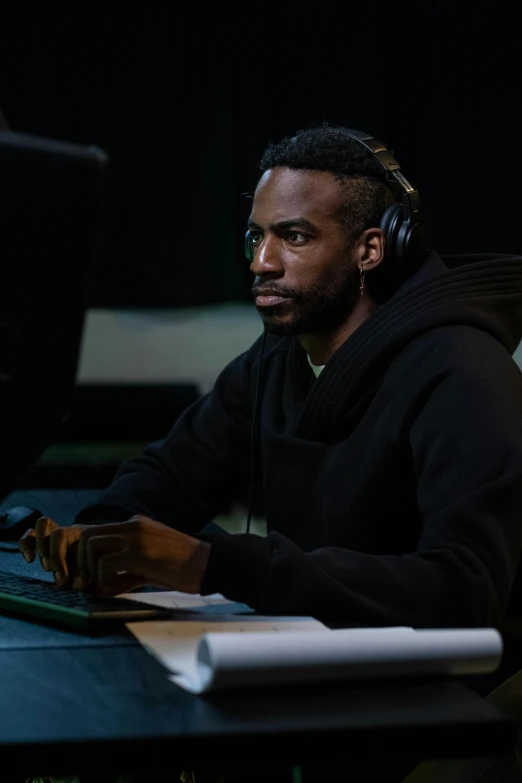 a man sitting at a desk in front of a computer, sakuga gunplay, dark mode, discord profile picture, modern warfare