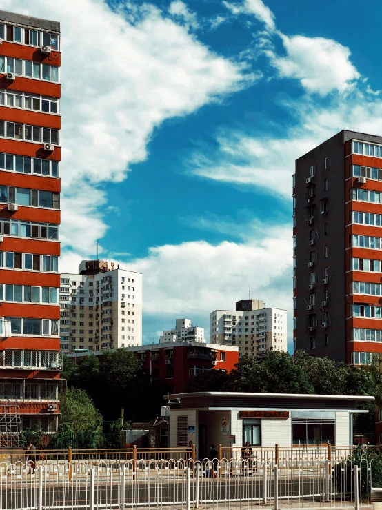 a couple of tall buildings sitting next to each other, an album cover, inspired by Thomas Struth, unsplash, brutalism, soviet suburbs, ultra realistic 8k octan photo, panoramic view, 2000s photo