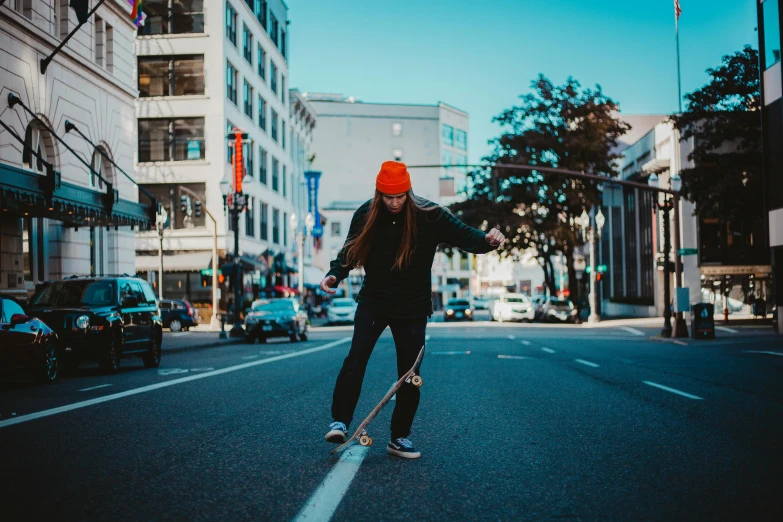a man riding a skateboard down the middle of a street, pexels contest winner, wielding a crowbar, portland oregon, woman in streetwear, thumbnail