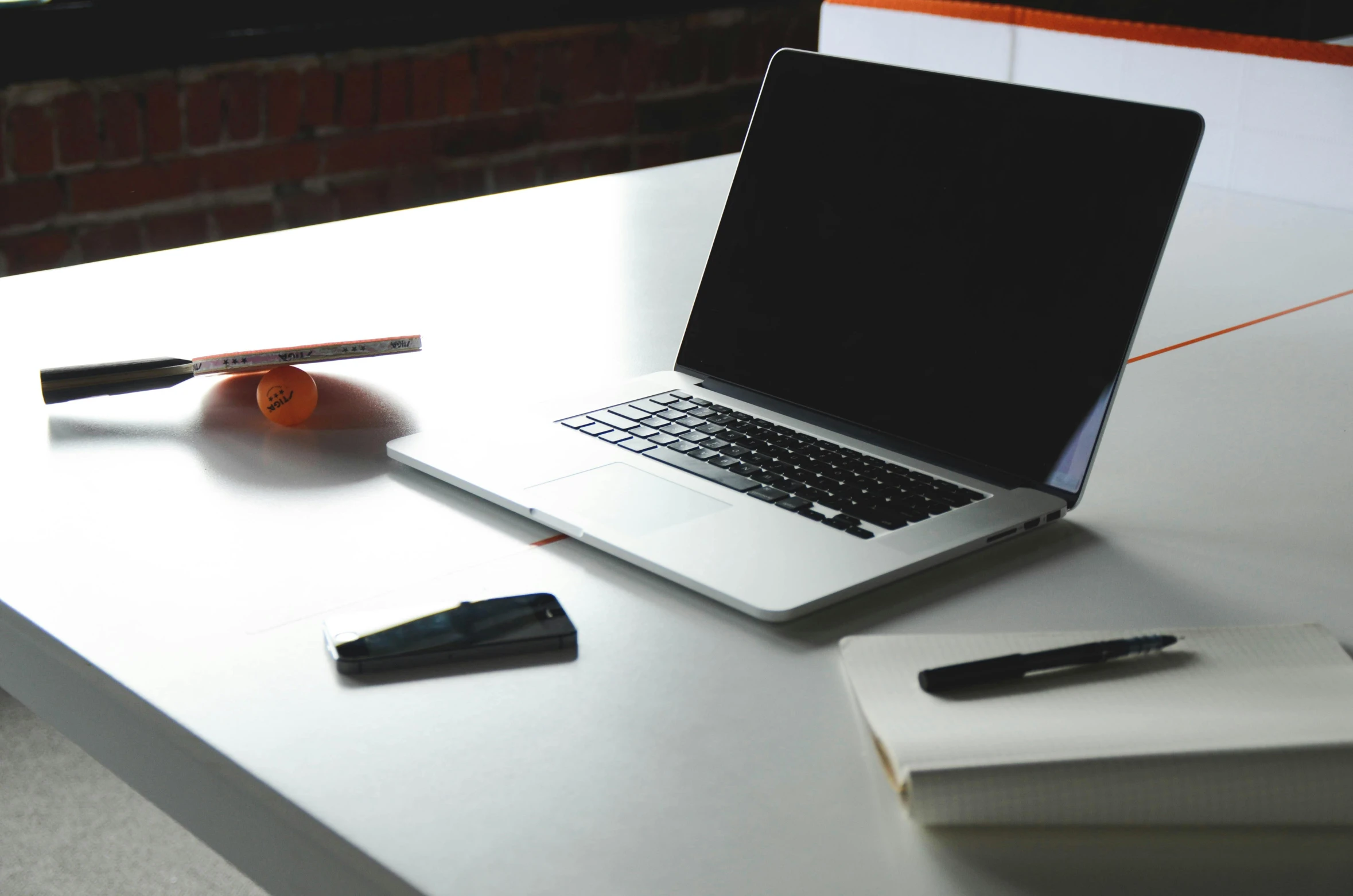 a laptop computer sitting on top of a white table, pexels, 9 9 designs, dark. no text, document photo, maintenance