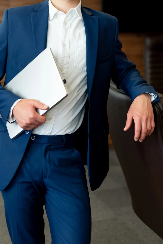 a man in a blue suit holding a briefcase, pexels, renaissance, holding notebook, no - text no - logo, zoomed in, thumbnail