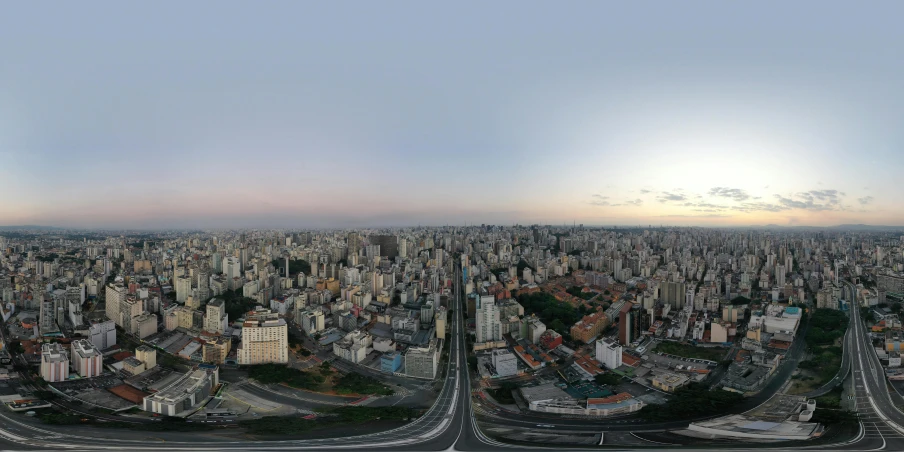 a panoramic view of a city at sunset, an album cover, by Fernando Gerassi, reddit, hyperrealism, sao paulo, aerial view cinestill 800t 18mm, 8 k high resolution image, 3 6 0 panorama