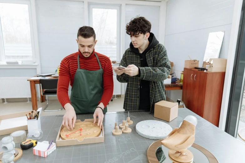 a couple of men standing next to each other in a room, pexels contest winner, arbeitsrat für kunst, lawther sit at table playing dnd, resin and clay art, 15081959 21121991 01012000 4k, professional product photo