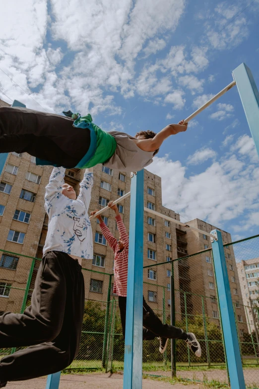 a man riding a skateboard on top of a metal pole, unsplash, socialist realism, people falling off a playground, orthodox, local gym, in the center of the image