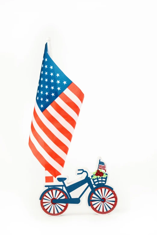 a toy bike with an american flag on it, by John Backderf, paper cut out, white background, hanging, promo image