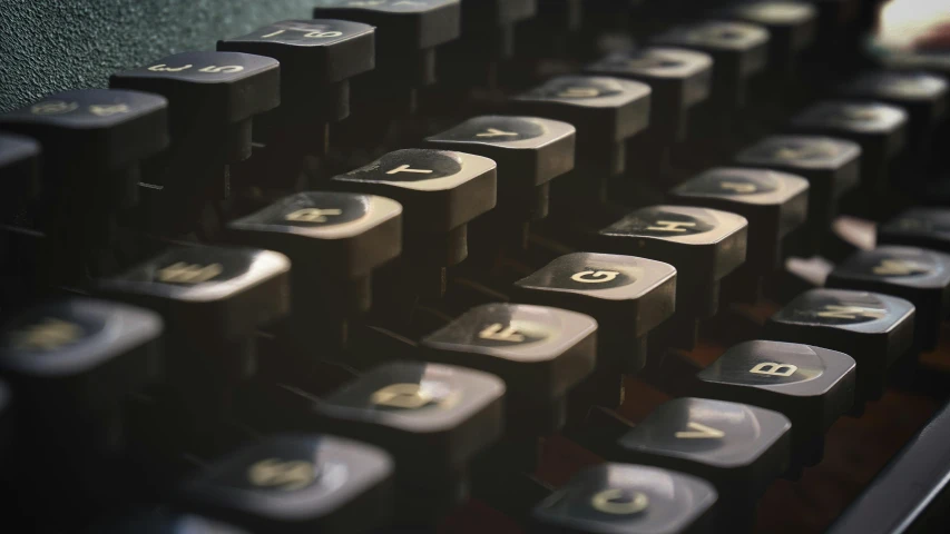 a close up of an old typewriter keyboard, a macro photograph, by Carey Morris, unsplash, private press, multiple stories, in a row, alessio albi, brown