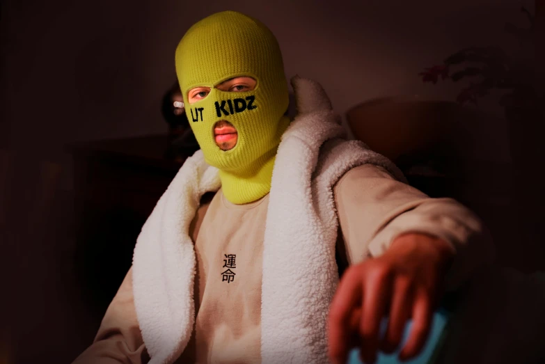 a person wearing a ski mask and holding a pair of scissors, inspired by Zhang Xiaogang, instagram, glowing yellow face, teddy fresh, ut 4, with a kid