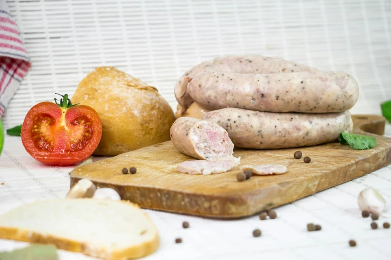 a bunch of sausages sitting on top of a cutting board, a portrait, inspired by Eugène Boudin, unsplash, brown bread with sliced salo, on white, full body in shot, chicken