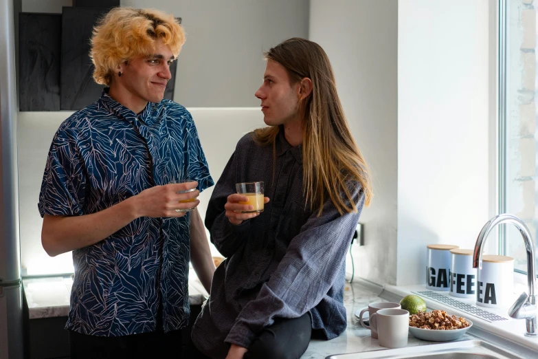 a man and a woman standing in a kitchen, by Nina Hamnett, trending on reddit, foliage clothing, profile image, wearing pajamas, blonde guy