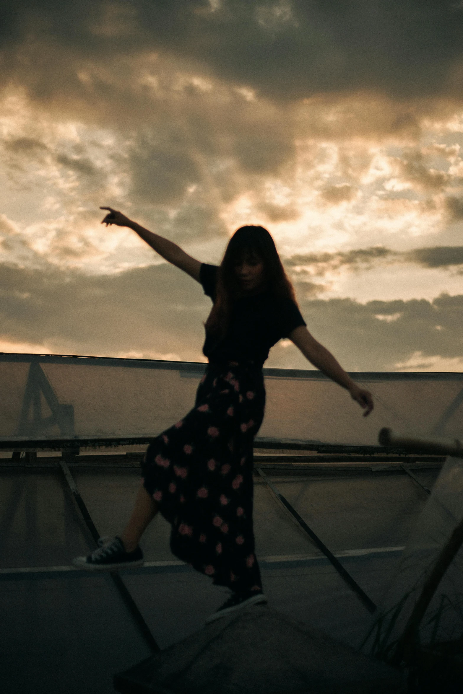 a woman flying through the air while riding a skateboard, pexels contest winner, happening, rooftop romantic, sunset mood, standing on top of a piano, lo fi