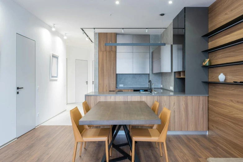 a kitchen with a table and chairs in it, by Adam Marczyński, light and space, fan favorite, neo kyiv, award winning interior design, most respected design