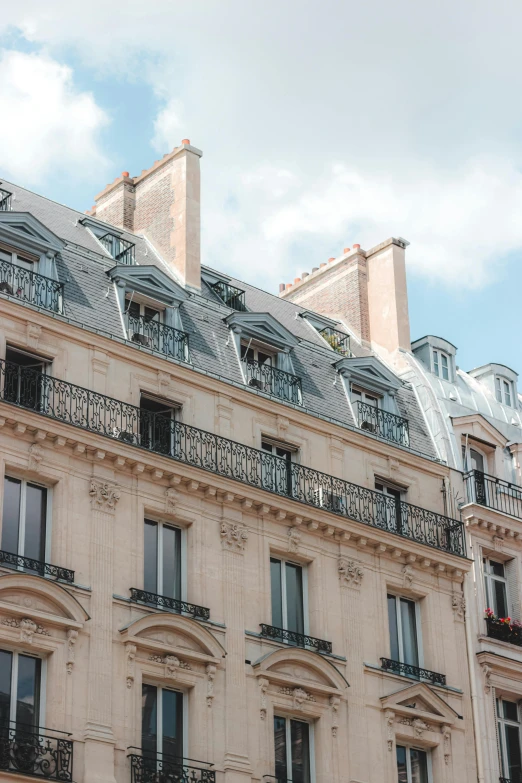 a very tall building with many windows and balconies, trending on unsplash, paris school, gambrel roof, marie - gabrielle capet style, detail shots, square