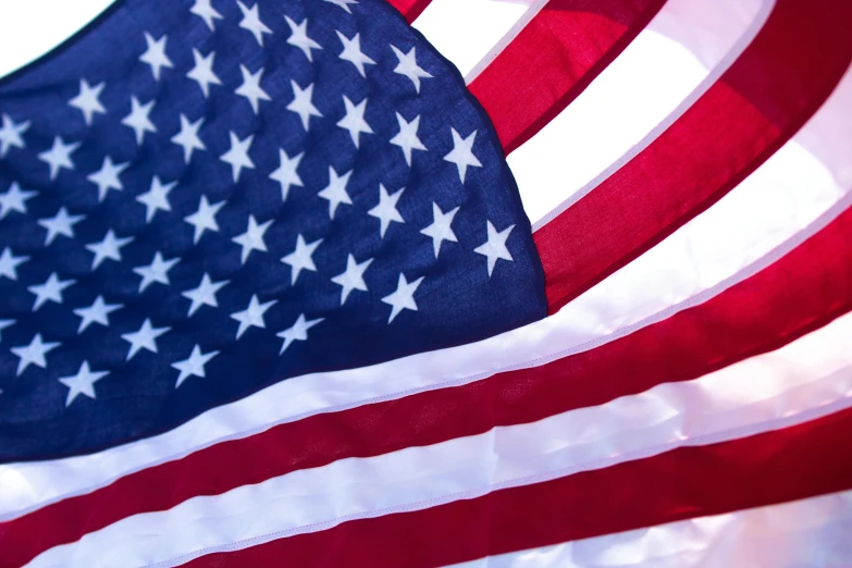 an american flag blowing in the wind, pexels, avatar image, middle close up, instagram post, rendered in 4 k