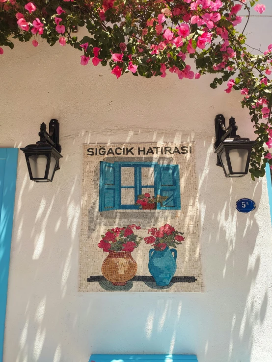 a blue bench sitting in front of a white building, poster art, by Ingrida Kadaka, pexels contest winner, lamps and flowers, thatched roof, hydra, bright signage