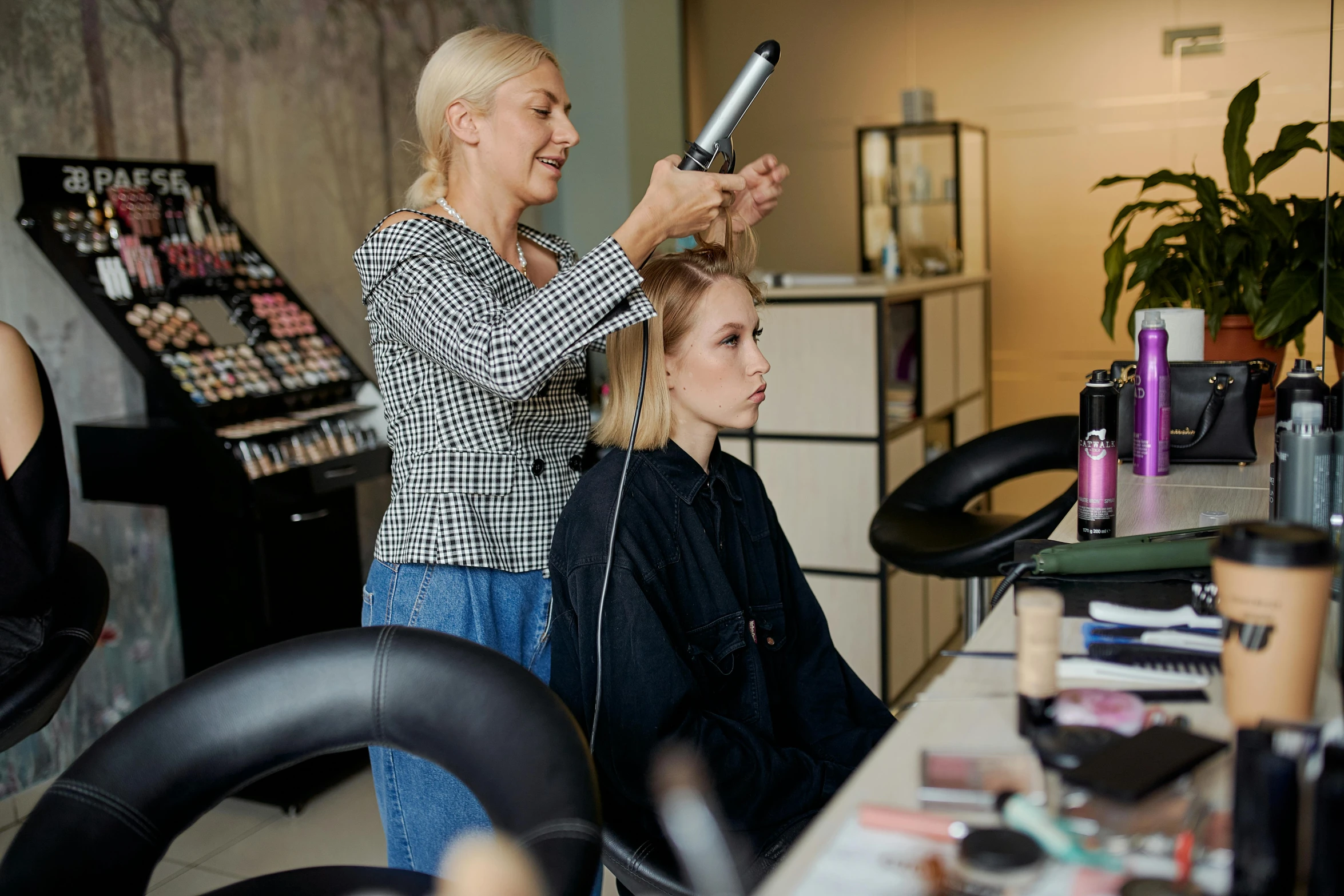 a woman blow drying another woman's hair in a salon, by Terese Nielsen, pexels contest winner, renaissance, thumbnail, stylish make up, blonde crea, full lenght