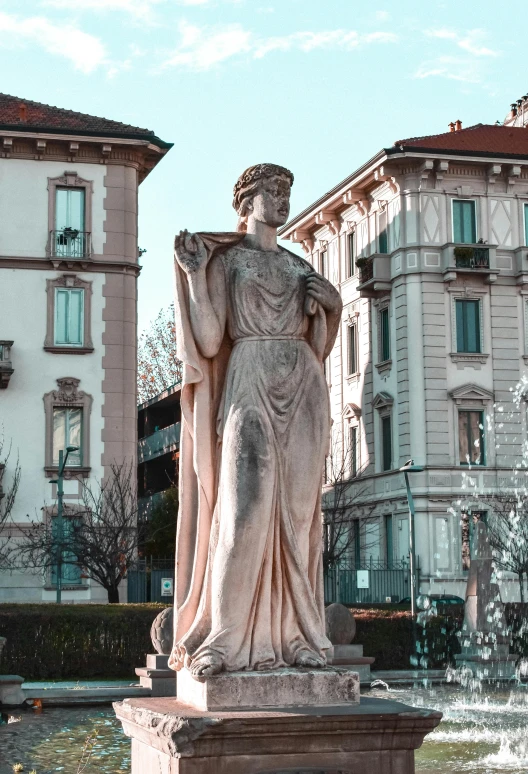 a statue of a woman standing next to a fountain, a statue, inspired by Giovanni Battista Innocenzo Colombo, pexels contest winner, neoclassicism, square, surrounding the city, made of marble, naboo