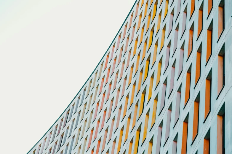 a close up of a building with a clock on it, by Konrad Witz, pexels contest winner, modernism, colorful - patterns, orange pastel colors, square lines, dots abstract